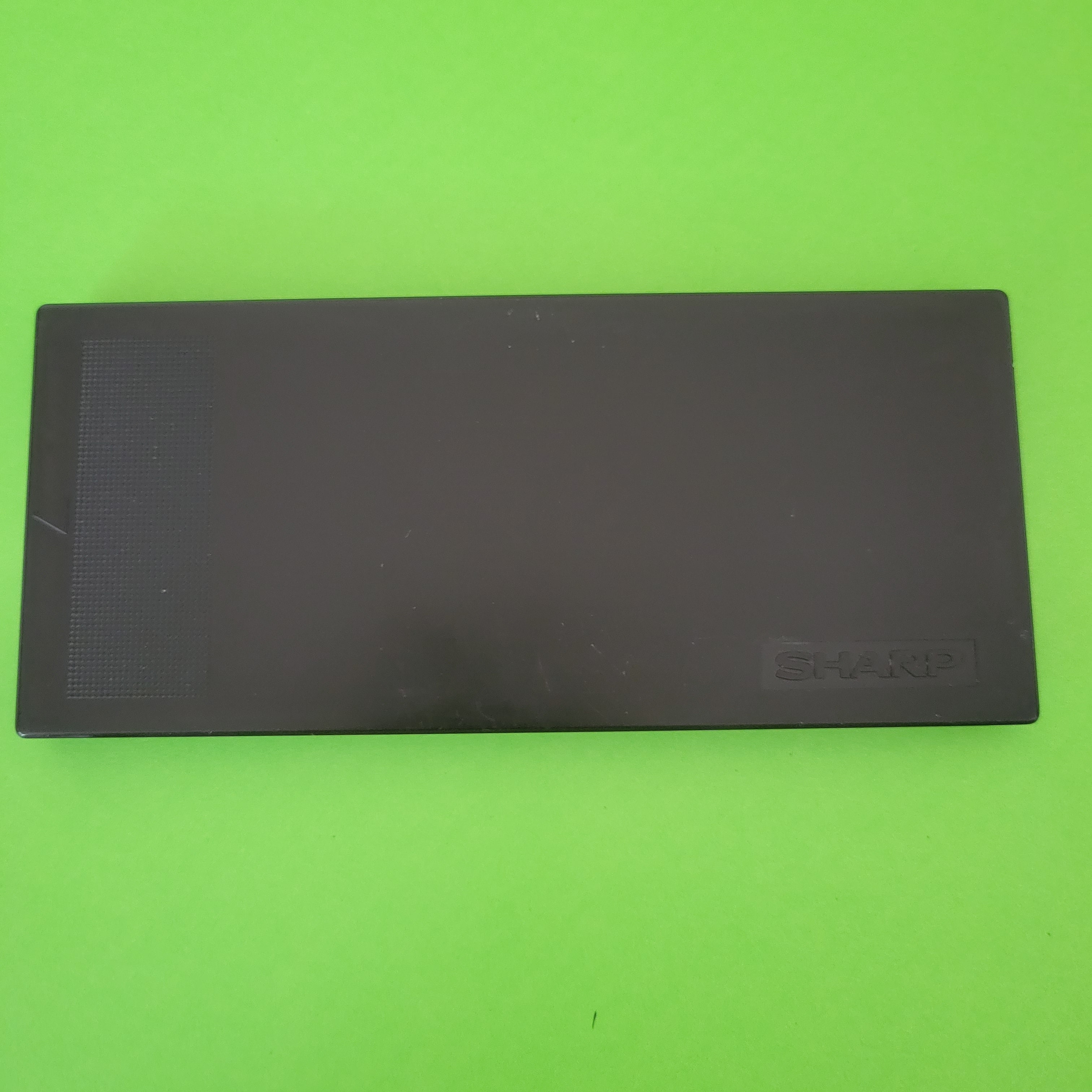 An image of the front of the case of a Sharp PC-1401 Pocket PC